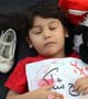 تصاویر:: اسامی کودکان شهید غزه برسینه دانش‌آموان مشهدی
