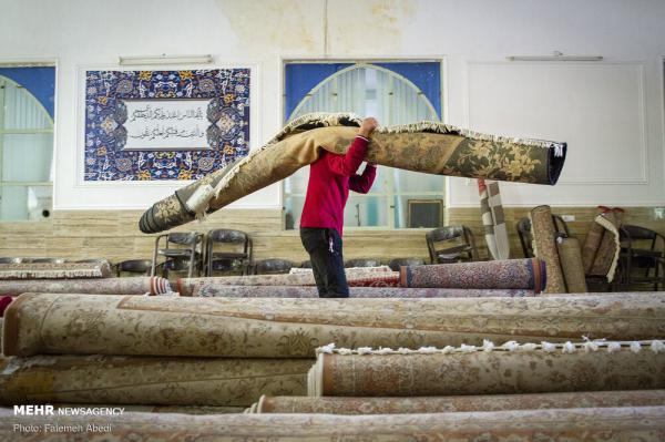 تصاویری از کارگاه قالیشویی در روزهای کرونایی