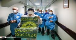 ببینید| دگرگون شدن حال و هوای یک بیمارستان کرونایی با پرچم امام رضا