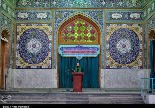 تصاویر| تعویض پرچم گنبد مسجد جمکران به‌ مناسبت محرم