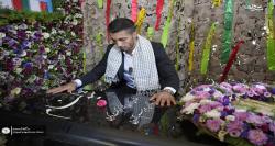 تصاویر|  اهدای مدال طلای گرایی به شهید گمنام