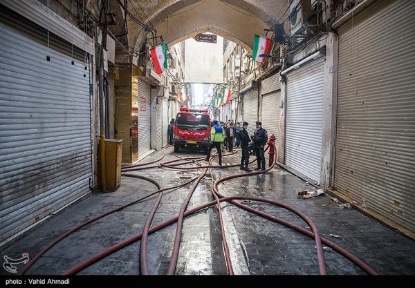 تصاویر| وقوع آتش‌سوزی در بازار تهران
