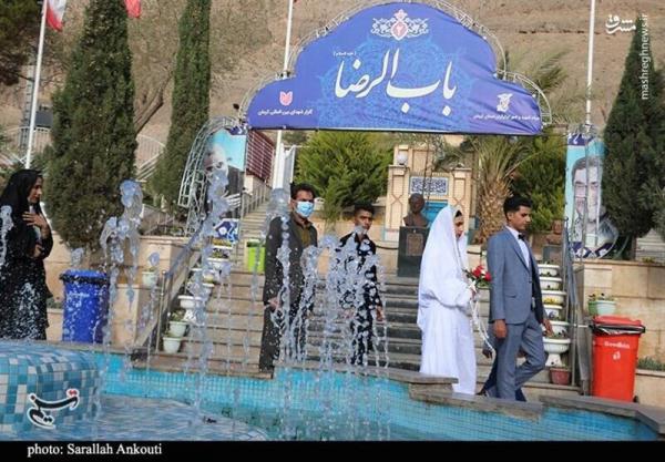 تصاویر| آغاز زندگی مشترک زوج جوان در جوار مزار حاج قاسم