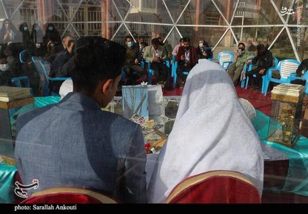 تصاویر| آغاز زندگی مشترک زوج جوان در جوار مزار حاج قاسم