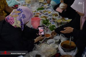 تصاویر| ضیافت افطار در بین الحرمین