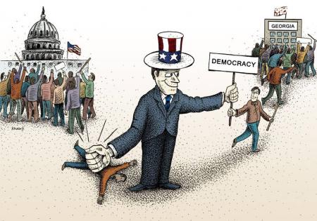 کاریکاتور|  آشوبگری آمریکایی به بهانه دموکراسی