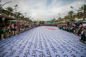 تصاویر| اجتماع دانش آموزان عراقی در بین‌الحرمین برای حمایت از غزه