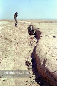 عکاسان و خبرنگاران در دفاع مقدس +عکس