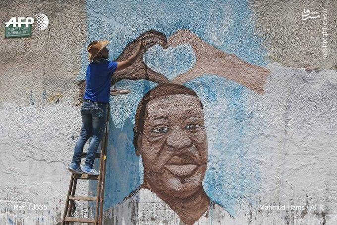 نقاشی دیواری هنرمند فلسطینی از چهره جورج فلوید