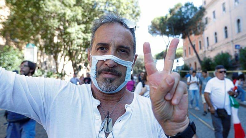تظاهرات بر علیه ماسک صورت در ایتالیا +عکس