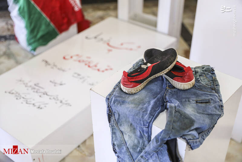 صحنه‌ای متاثر کننده از لباس‌های کودک شهید اهواز
